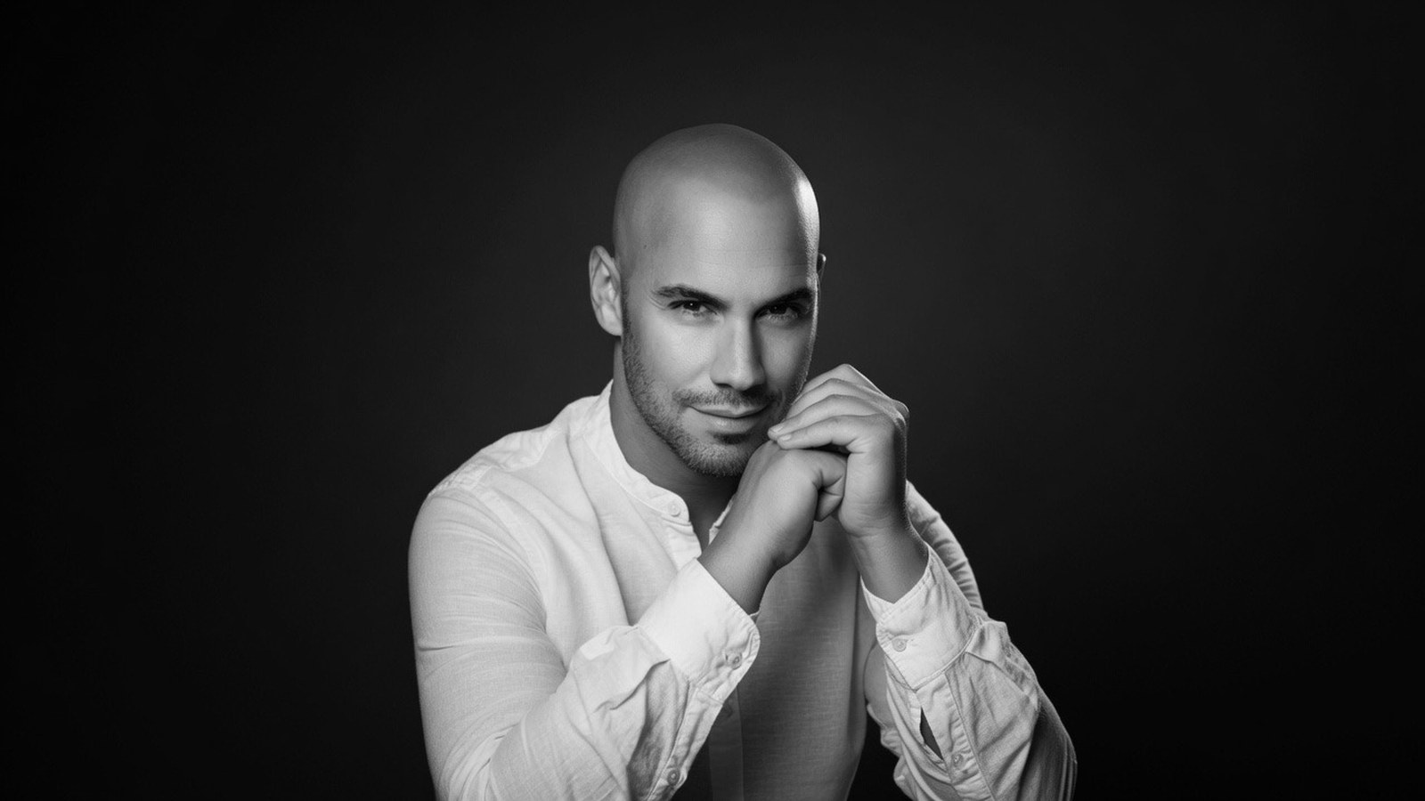Black-and-white portrait of Ari Leal
